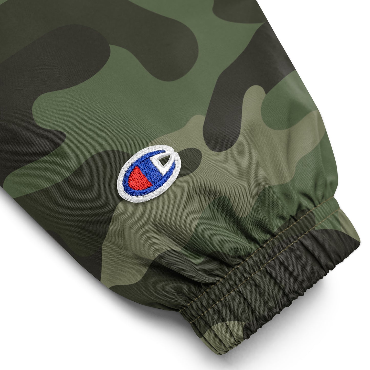 Wildfire Cigars embroidered camouflage packable jacket zoomed in on sleeve