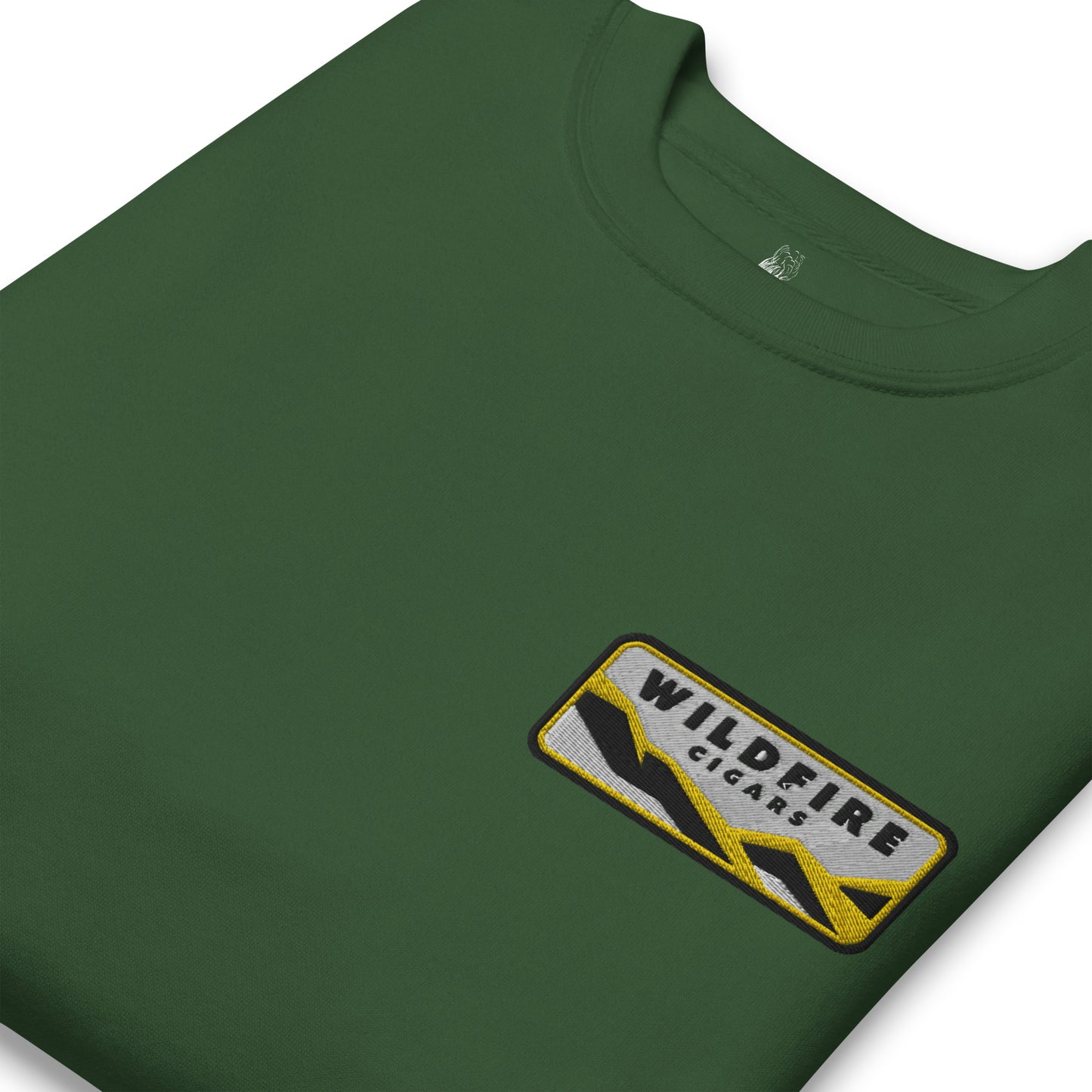Wildfire Cigars embroidered left chest on forest green premium sweatshirt folded