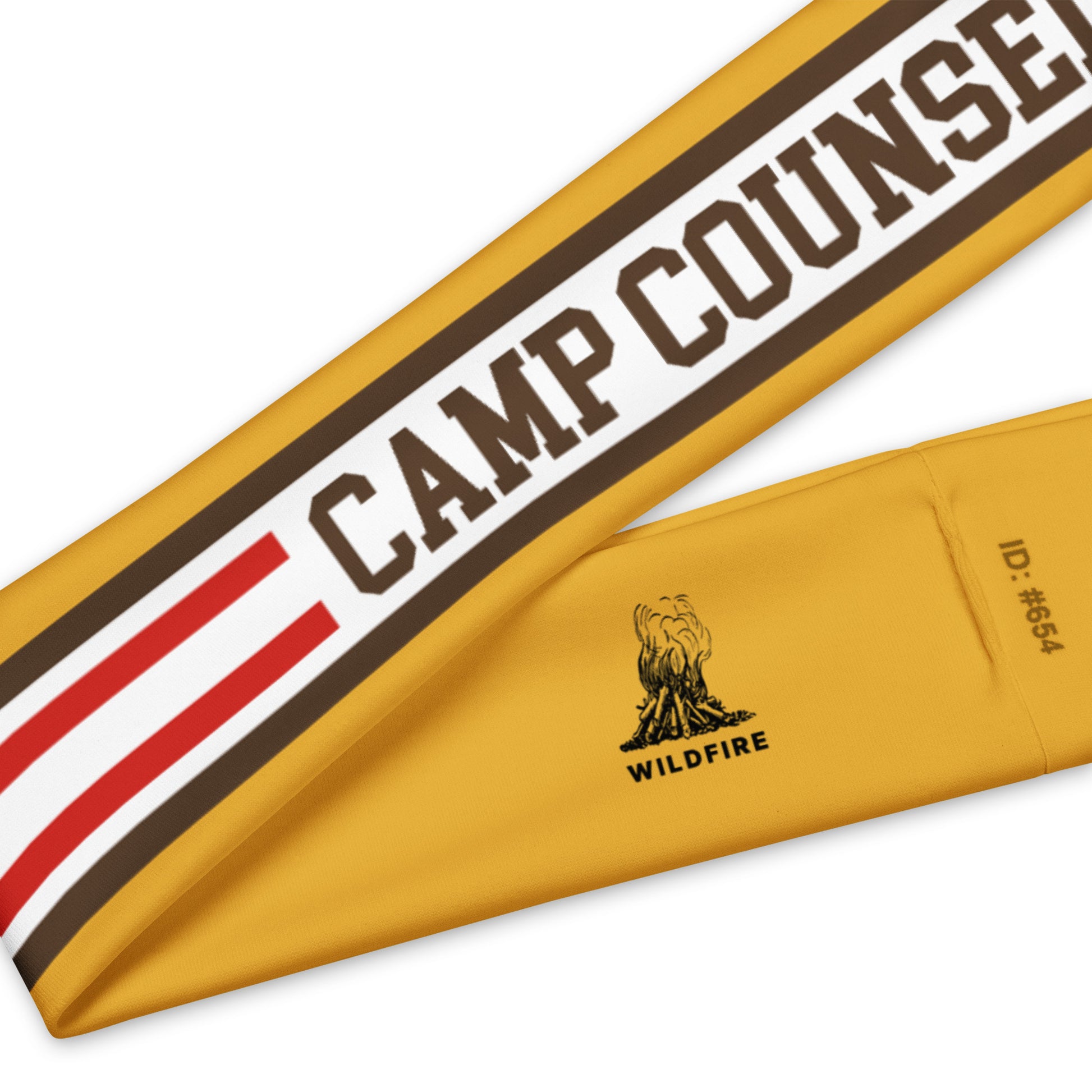 Wildfire Cigars Camp Counselor headband in gold facing the front zoomed in to inside label details