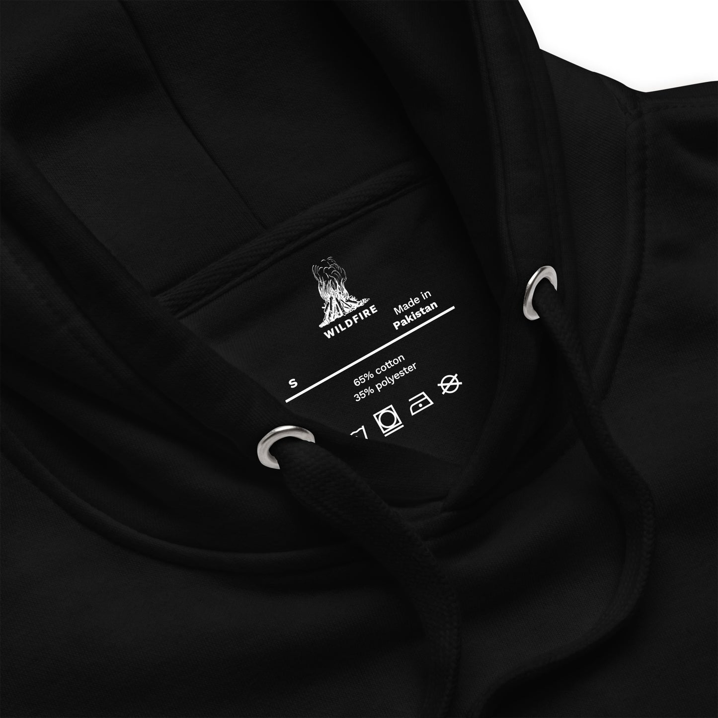 Wildfire Cigars embroidered bison skull on the left chest of a black premium hoodie inside label detailst